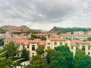 a group of buildings in a city with trees at STAYCITY OTEL in Altındağ