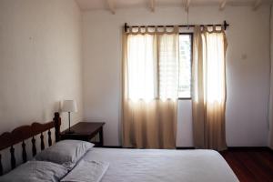 Postel nebo postele na pokoji v ubytování Casa Wolaba