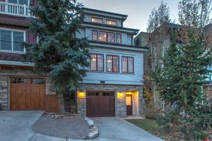 a house with a garage in front of it at 521 Woodside Gem True Ski-In Ski-Out on the Gold Coast home in Park City