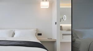 Letto o letti in una camera di Swiio Hotel Daan