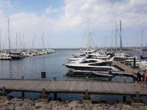 a bunch of boats docked in a harbor at "thousand lakes" Comfortable holiday residence in Marienfelde