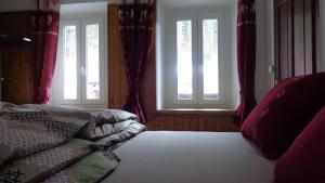 Ένα ή περισσότερα κρεβάτια σε δωμάτιο στο Appartamento Lidia Astor