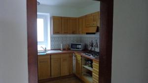 Η κουζίνα ή μικρή κουζίνα στο Appartamento Lidia Astor