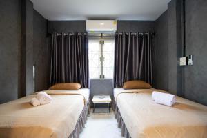 Letto o letti in una camera di Mango tree อ่าวมะขามป้อม