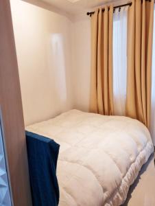 Postel nebo postele na pokoji v ubytování Staycation at Sea Residences Suite B1202 + 9 fotografií