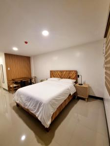 Postel nebo postele na pokoji v ubytování Flat 35, Unit 1E