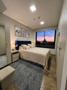 Ένα ή περισσότερα κρεβάτια σε δωμάτιο στο Depto exclusivo en Carmelitas