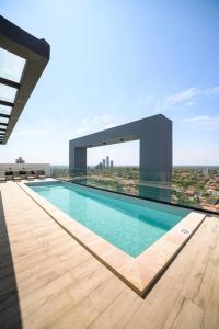 Πισίνα στο ή κοντά στο Depto exclusivo en Carmelitas