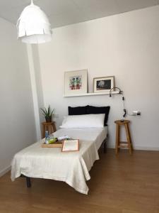 Postel nebo postele na pokoji v ubytování MON ComeySueña Guesthouse + 11 fotografií