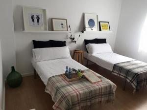 Postel nebo postele na pokoji v ubytování MON ComeySueña Guesthouse