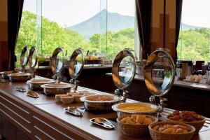 a buffet with many dishes of food on a table at Hakodate-Onuma Prince Hotel in Nanae
