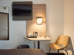 Příslušenství pro přípravu čaje a kávy v ubytování B&B HOTEL Vejle