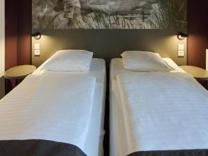 B&B HOTEL Vejle客房内的一张或多张床位