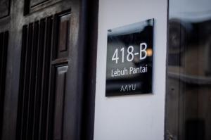 a sign on the side of a building at Heritage Villa by Aayu - 10 mins walk to Armenian St in George Town
