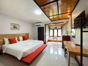 Postel nebo postele na pokoji v ubytování Mookboonchu Guesthouse ,Kohmook Trang + 218 fotografií