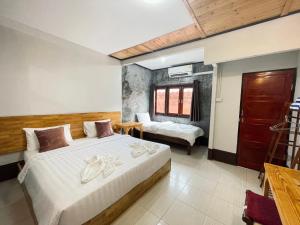 Fotografie z fotogalerie ubytování Mookboonchu Guesthouse ,Kohmook Trang v destinaci Ko Mook + 37 fotografií