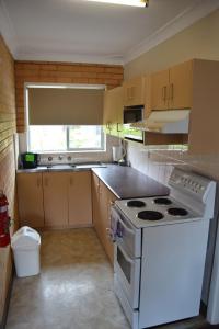 Η κουζίνα ή μικρή κουζίνα στο Wards Holiday Flat 4 +5 φωτογραφίες