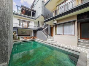 Bazén v ubytování Giriya Amerta Hotel nebo v jeho okolí
