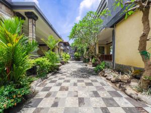 Zahrada ubytování Giriya Amerta Hotel + 29 fotografií
