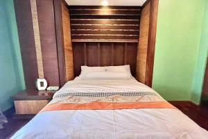 Letto o letti in una camera di h6市中心 唐人街 航站楼 风月街五房芭提雅海天-泳池别墅o