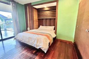 Letto o letti in una camera di h6市中心 唐人街 航站楼 风月街五房芭提雅海天-泳池别墅o