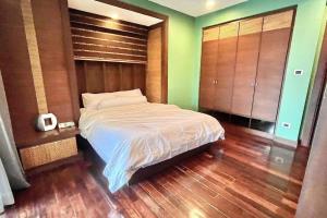 Letto o letti in una camera di h6市中心 唐人街 航站楼 风月街五房芭提雅海天-泳池别墅o