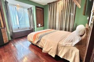 Letto o letti in una camera di h6市中心 唐人街 航站楼 风月街五房芭提雅海天-泳池别墅o