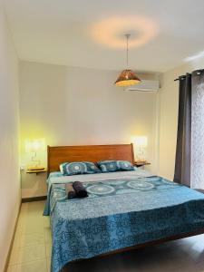 Ένα ή περισσότερα κρεβάτια σε δωμάτιο στο Coquilles D'Argent Apart +12 φωτογραφίες