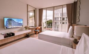 Телевизор и/или развлекательный центр в Golf Valley Hotel +73 фотографии