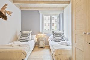 Posteľ alebo postele v izbe v ubytovaní Luderna - Apartamento Val de Ruda B22 Tuc Ermer