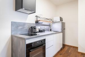 Kuchyňa alebo kuchynka v ubytovaní Apartmány Resort Vrchlabí