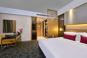 Letto o letti in una camera di Wyndham Acmar Klang