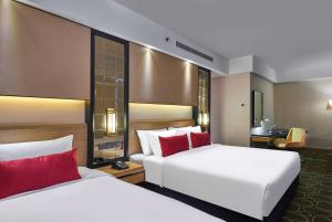 Letto o letti in una camera di Wyndham Acmar Klang