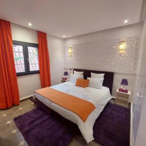 Postel nebo postele na pokoji v ubytování Riad Dar Augusta + 37 fotografií