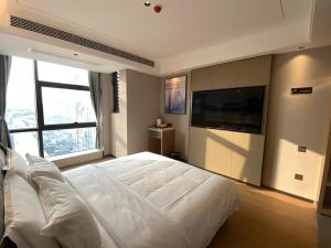 Nuotrauka iš apgyvendinimo įstaigos Yilong Michael International Hotel Suzhou Industrial Park Nanhuanqiao Market Branch mieste Jiangtian galerijos