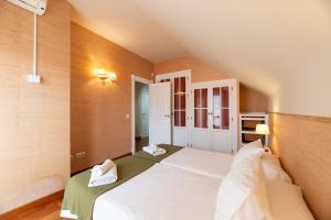 A bed or beds in a room at Benalmádena Coast Villa