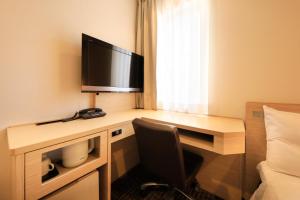 TV a/nebo společenská místnost v ubytování Via Inn Akihabara