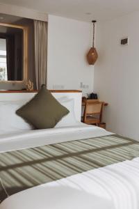 Postel nebo postele na pokoji v ubytování Mantra Wellness Center