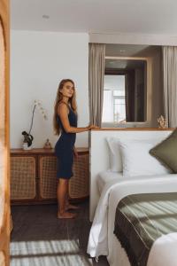 Postel nebo postele na pokoji v ubytování Mantra Wellness Center