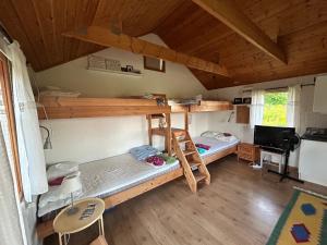 Voodi või voodid majutusasutuse Ulvsby Ranch Western Camp toas