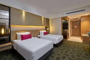 Letto o letti in una camera di Wyndham Acmar Klang
