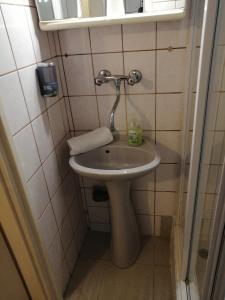 Koupelna v ubytování Flamingó Étterem, Magánszálláshely + 20 fotografií