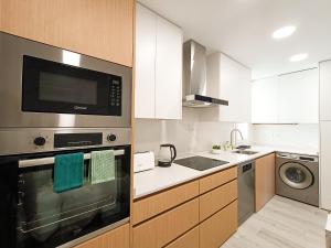 Η κουζίνα ή μικρή κουζίνα στο Madrid Private Rooms - Ferrer