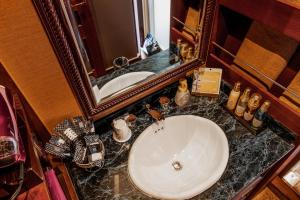 a bathroom with a white sink and a mirror at Hotel Salle de bain in Osaka +25 photos