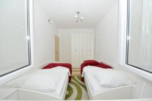 Posteľ alebo postele v izbe v ubytovaní Apartments Ivica