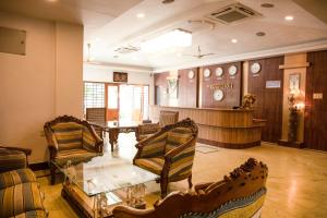 Posezení v ubytování SAARAL RESORTS & HOTELS PVT Ltd