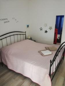 Postel nebo postele na pokoji v ubytování Apartments Mirela