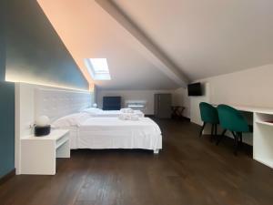 A bed or beds in a room at Le Stanze di Gianmarmo - Via di Mezzo