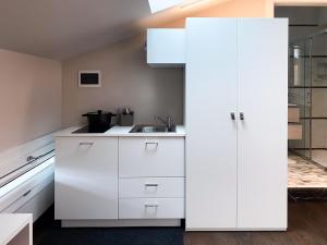 A kitchen or kitchenette at Le Stanze di Gianmarmo - Via di Mezzo