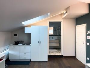 A kitchen or kitchenette at Le Stanze di Gianmarmo - Via di Mezzo